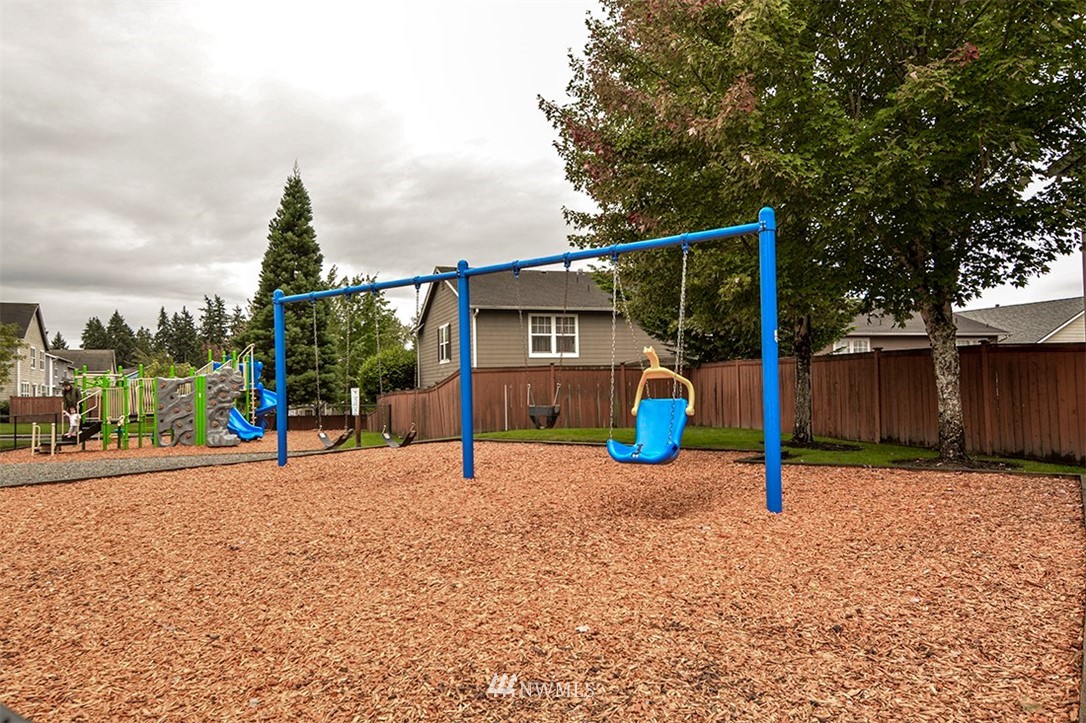 2402 Southeast 2nd Place Renton, WA 98056 - Photo 38 of 40 a view of a park with swings
