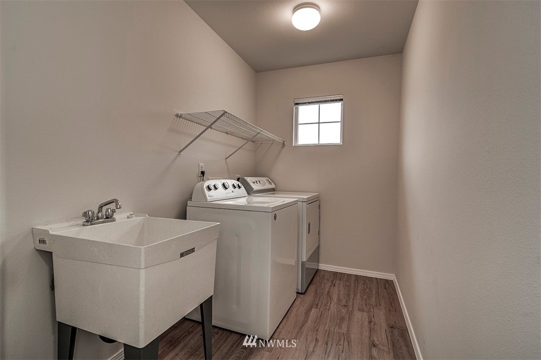 2402 Southeast 2nd Place Renton, WA 98056 - Photo 40 of 40 a utility room with dryer and washer