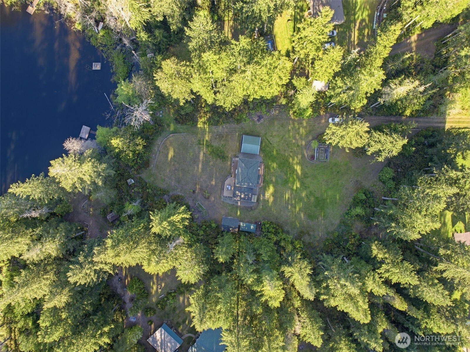6971 Northeast Tahuya Blacksmith Road Belfair, WA 98528 - Photo 30 of 38 a view of a garden with plants