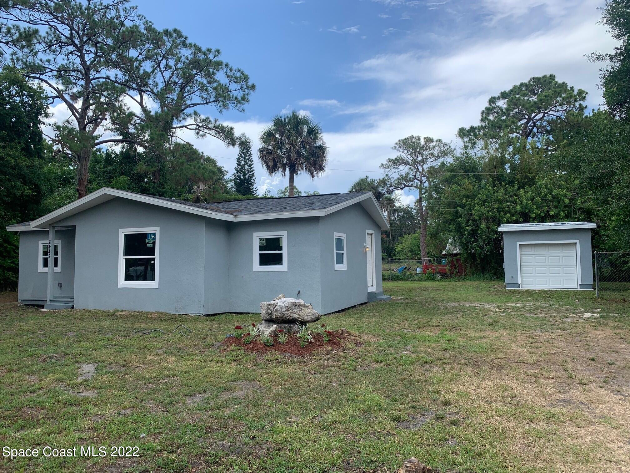 2442 Granger Road Cocoa, FL 32926 - Photo 1 of 44 front ext & garage
