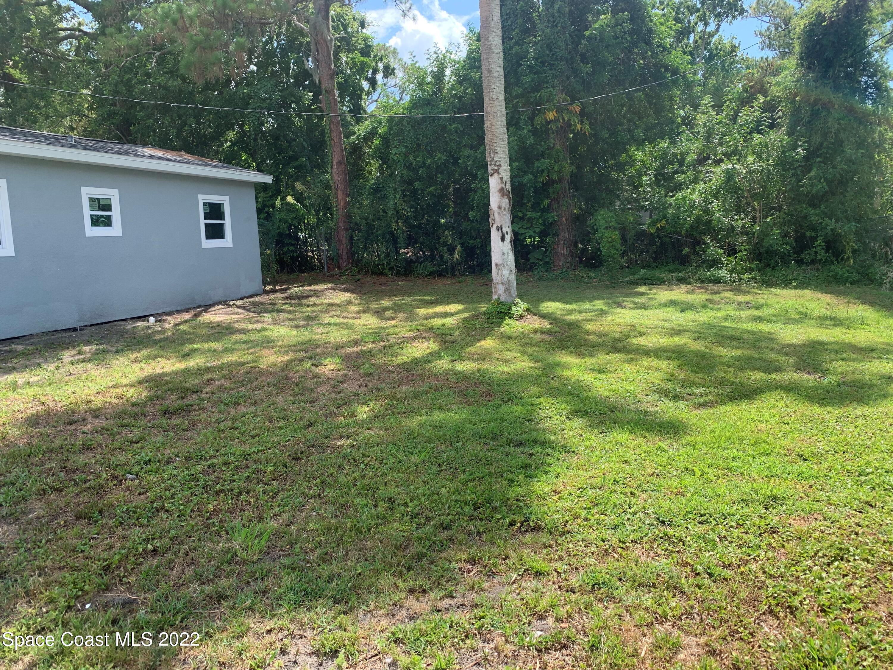 2442 Granger Road Cocoa, FL 32926 - Photo 4 of 44 back yard 1