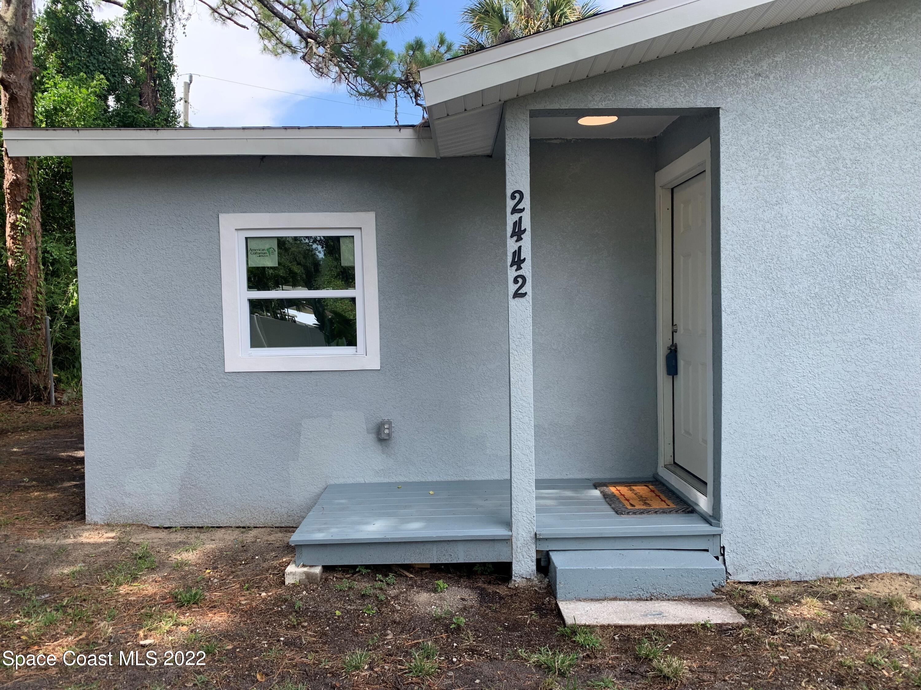 2442 Granger Road Cocoa, FL 32926 - Photo 41 of 44 front left side house
