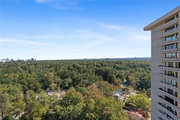 a view of a city with tall buildings