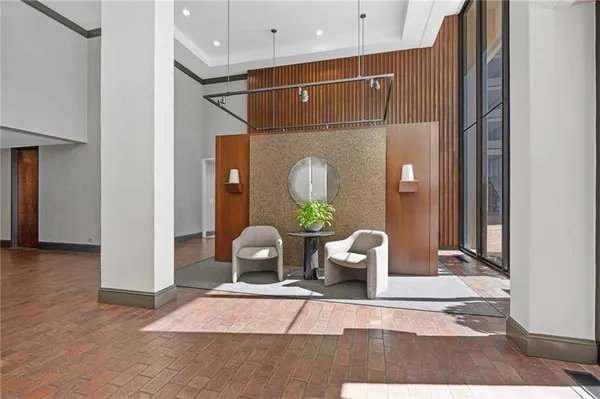 a living room with furniture and window