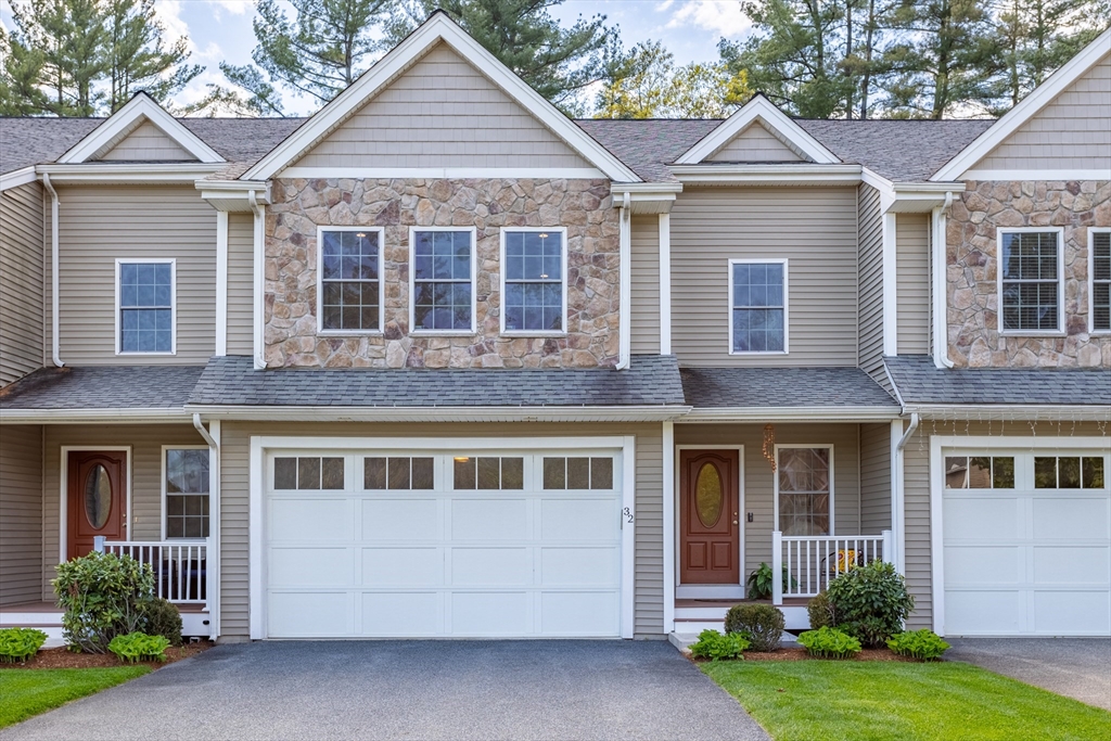 215 Rangeway Road, Unit 32 Billerica, MA 01862 - Photo 1 of 39 a front view of a house with a yard and potted plants