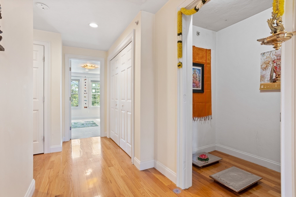 215 Rangeway Road, Unit 32 Billerica, MA 01862 - Photo 23 of 39 a view of room with window and wooden floor