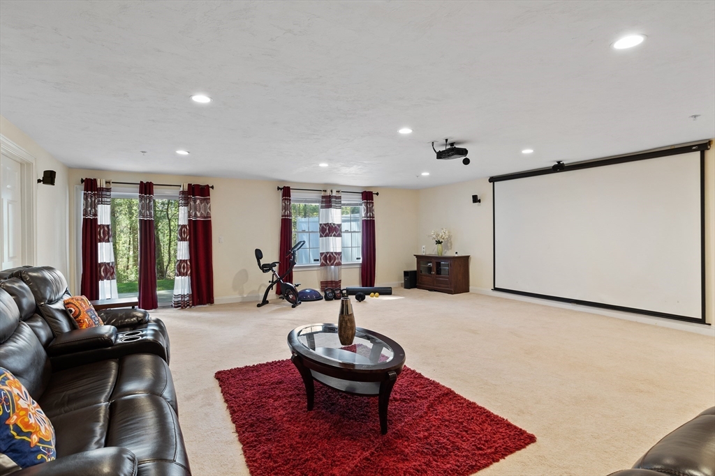 215 Rangeway Road, Unit 32 Billerica, MA 01862 - Photo 28 of 39 a living room with furniture and a large window