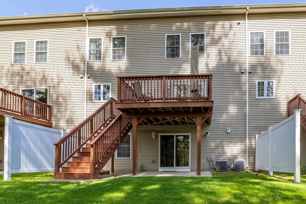 215 Rangeway Road, Unit 32 Billerica, MA 01862 - Photo 32 of 39 a view of a house with a yard and stairs