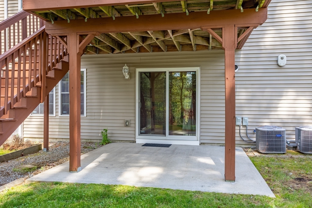 215 Rangeway Road, Unit 32 Billerica, MA 01862 - Photo 33 of 39 a view of a house with backyard and porch
