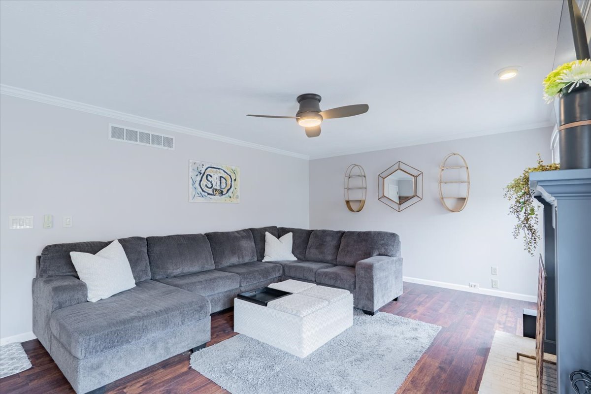 607 Old Farm Road Bloomington, IL 61704 - Photo 11 of 40 a living room with furniture and a rug