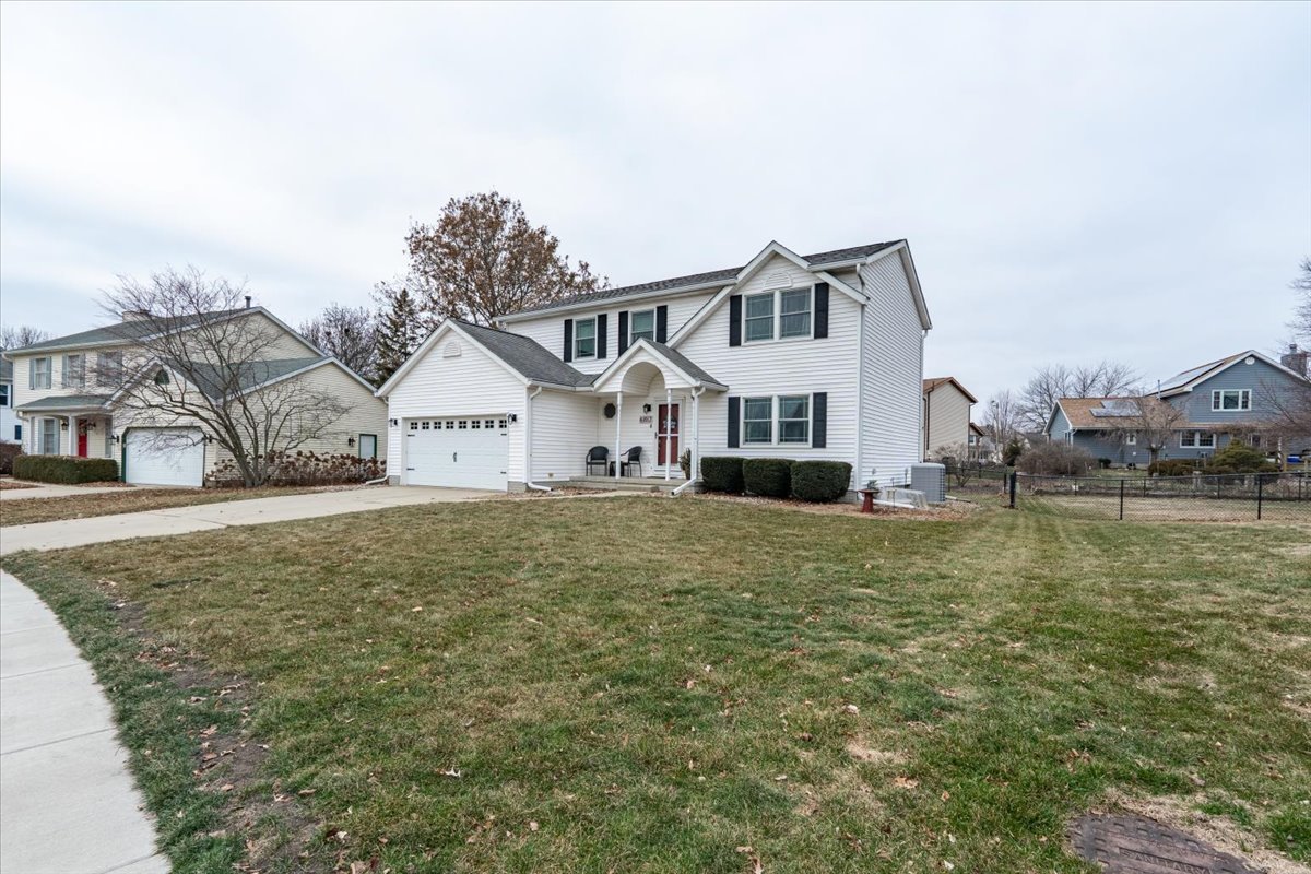 607 Old Farm Road Bloomington, IL 61704 - Photo 3 of 40 a house view with a outdoor space