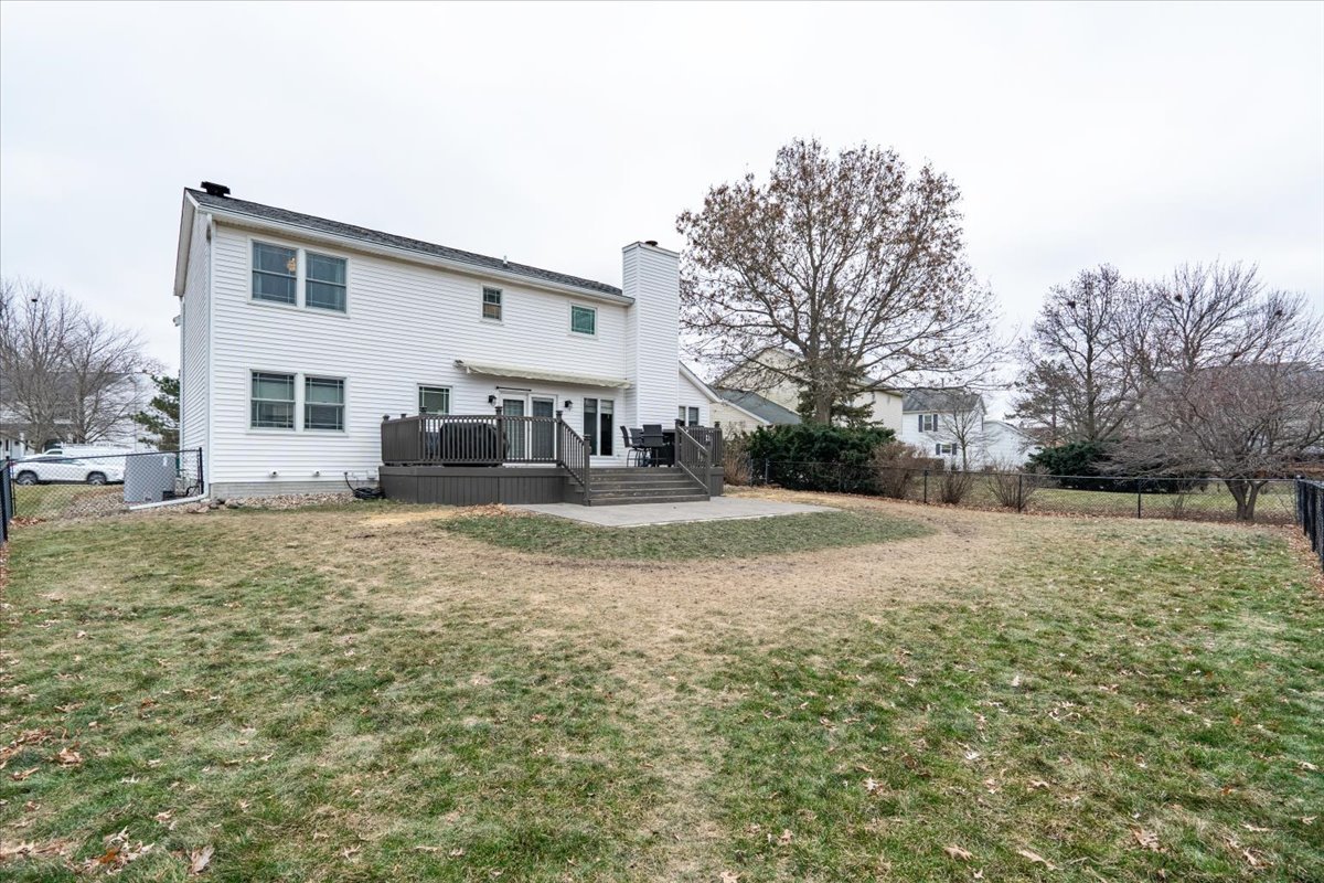 607 Old Farm Road Bloomington, IL 61704 - Photo 37 of 40 a view of a house with a yard