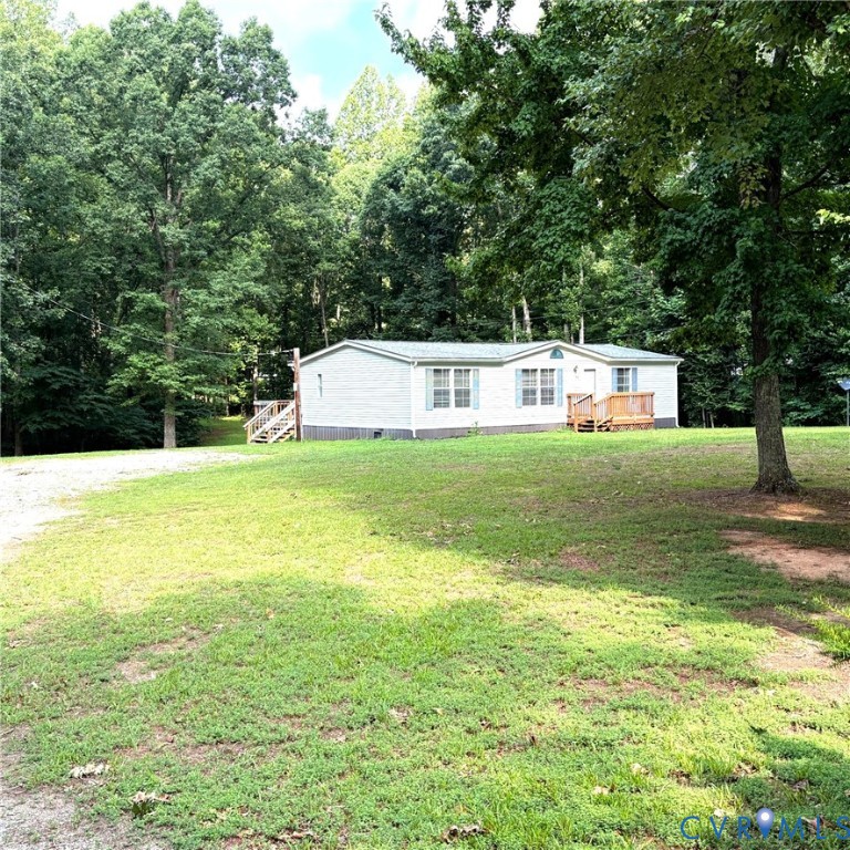 102 Frenchs Store Road Cumberland, VA 23040 - Photo 1 of 13 White siding residence featuring a light-colored r