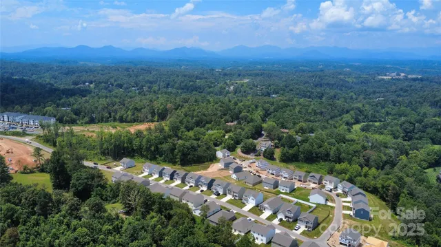 a view of a lake with a city