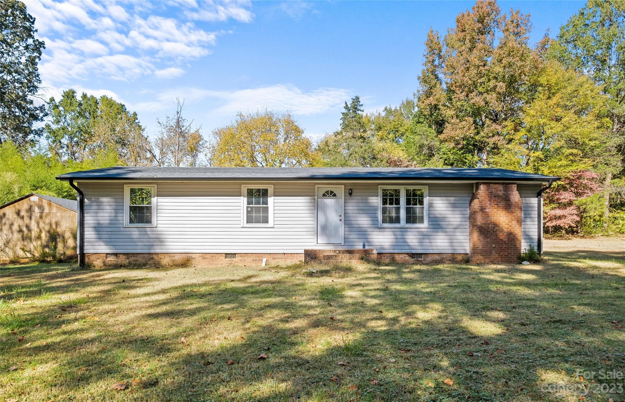 5100 Grand Canyon Road Northwest Concord, NC 28027 - Photo 22 of 39 front view of a house with a big yard