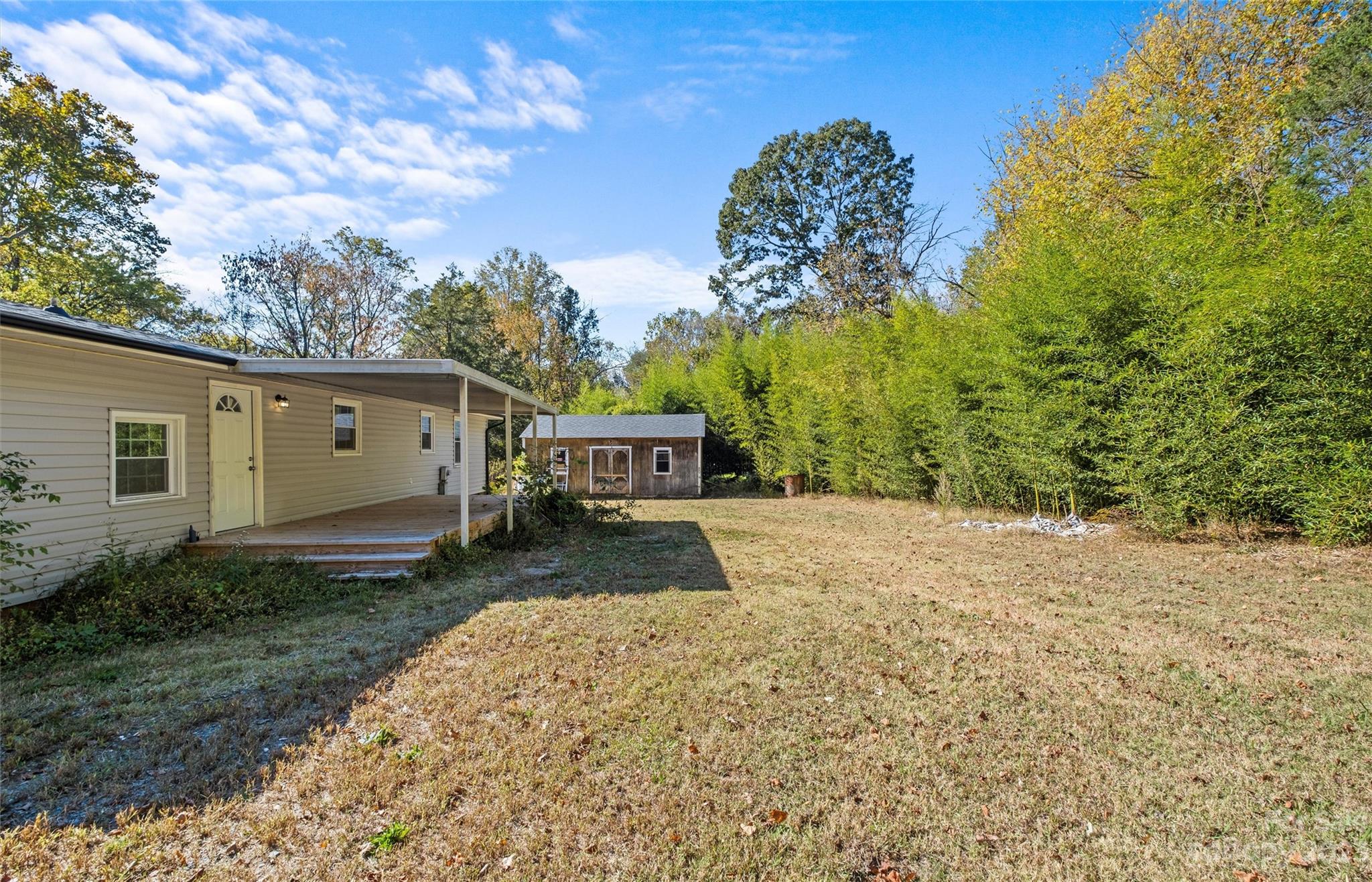 5100 Grand Canyon Road Northwest Concord, NC 28027 - Photo 24 of 39 a view of a house with a yard