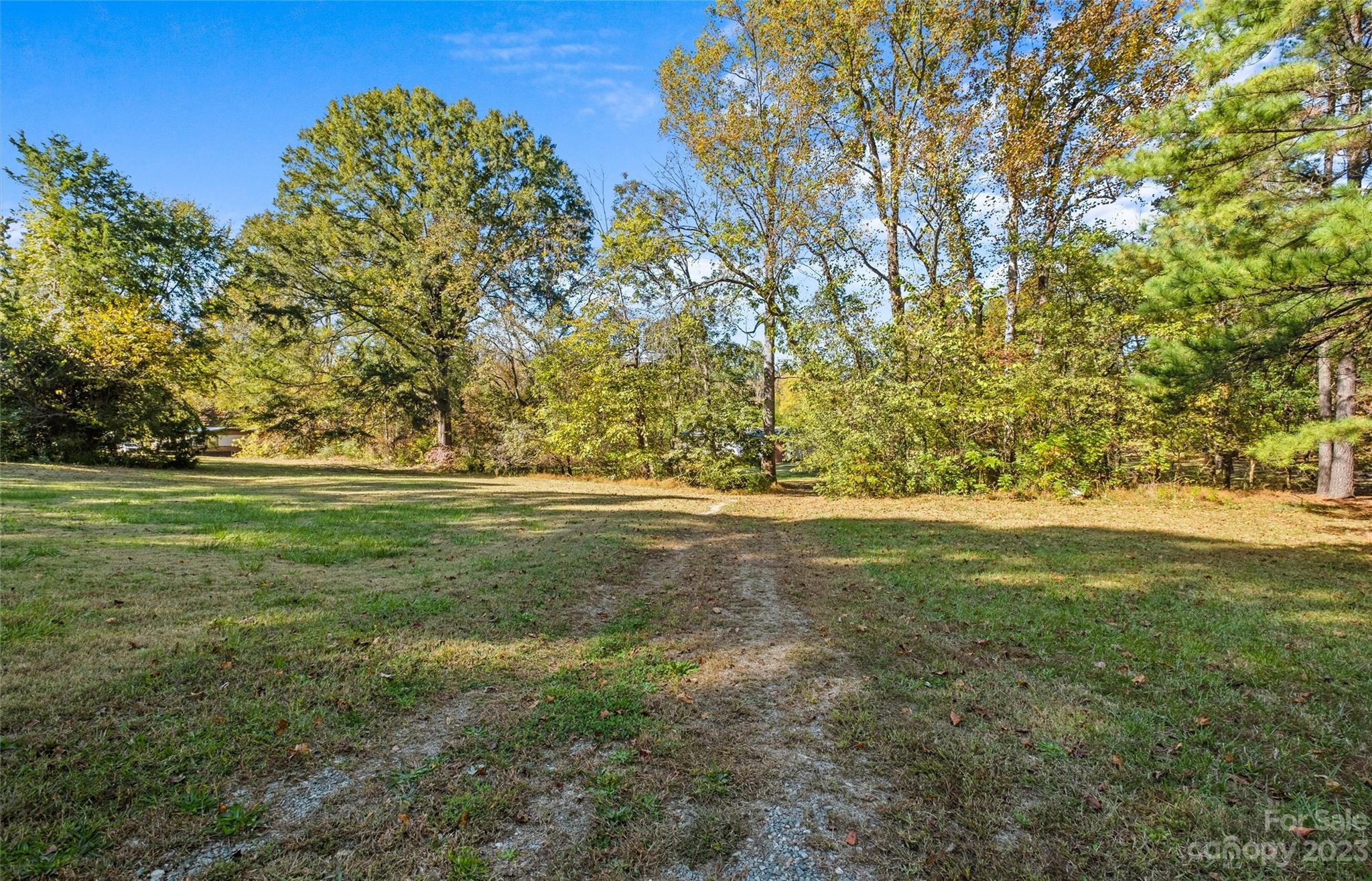 5100 Grand Canyon Road Northwest Concord, NC 28027 - Photo 31 of 39 a view of outdoor space with trees all around