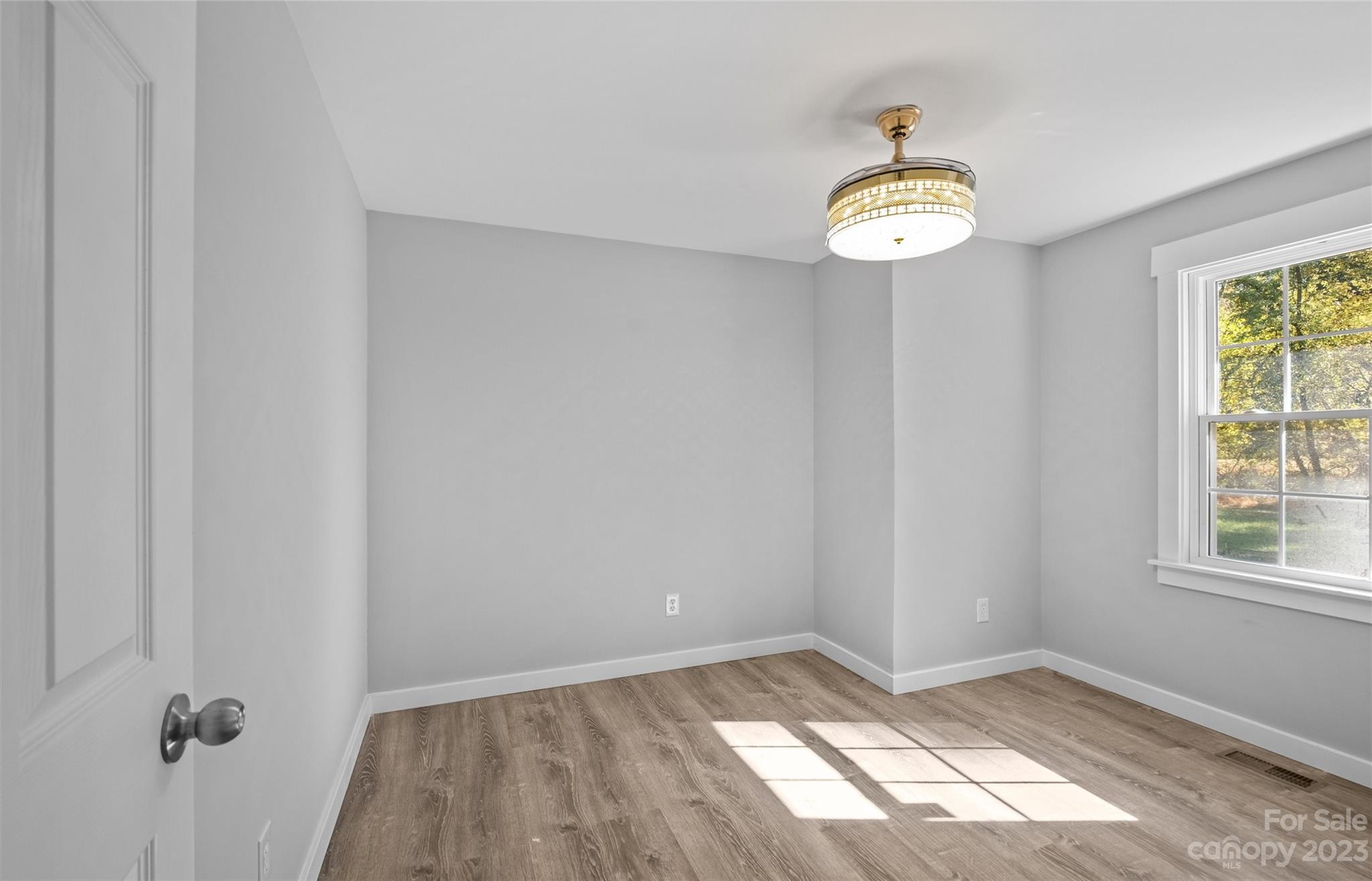 5100 Grand Canyon Road Northwest Concord, NC 28027 - Photo 10 of 39 an empty room with a window
