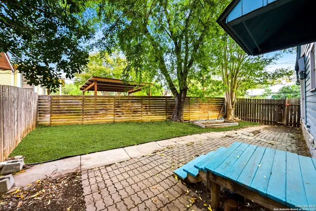 a view of a backyard with a garden