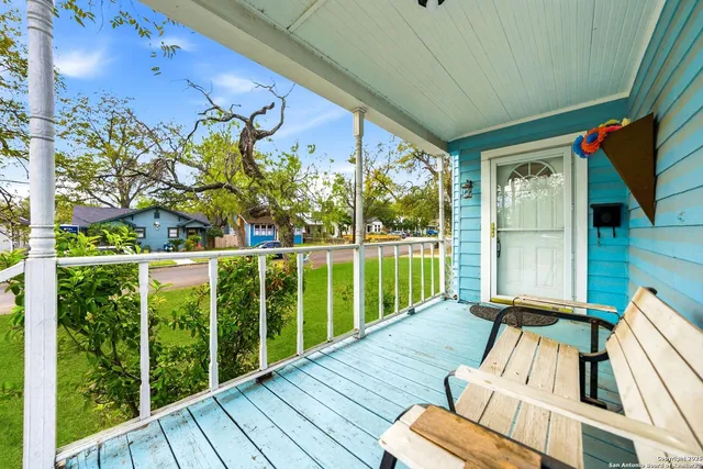 a view of balcony with furniture