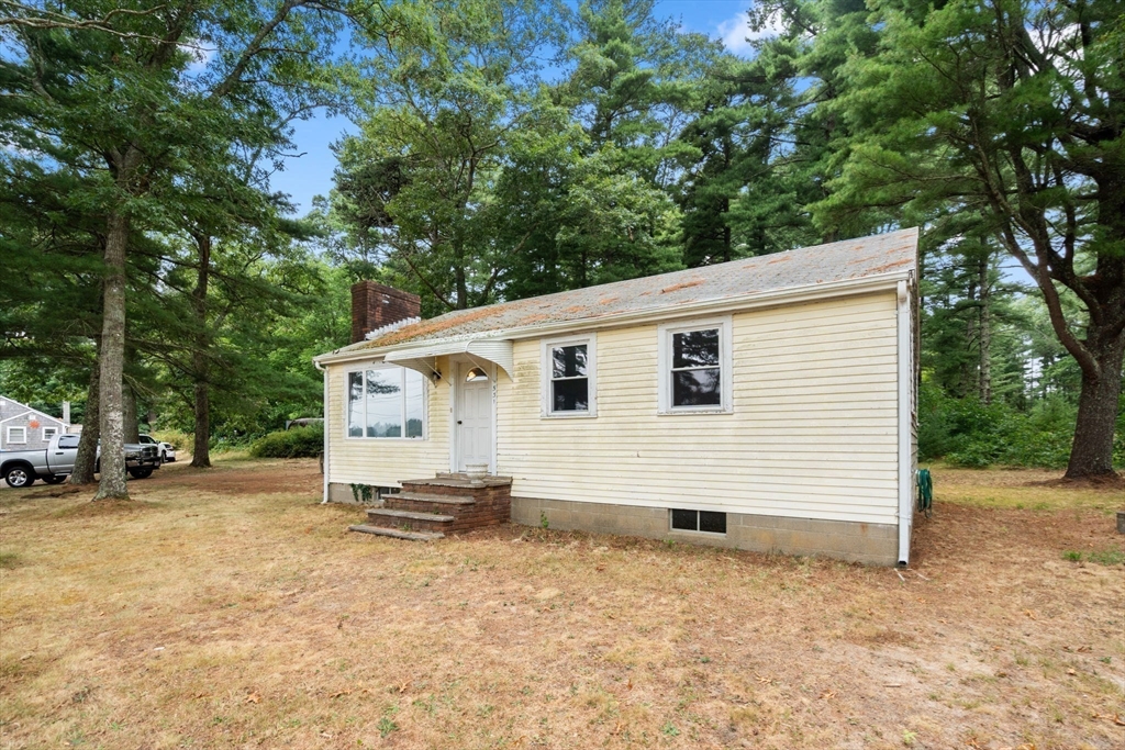 531 Marys Pond Road Rochester, MA 02770 - Photo 7 of 38 a view of a house with a yard