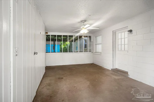 an empty room with windows