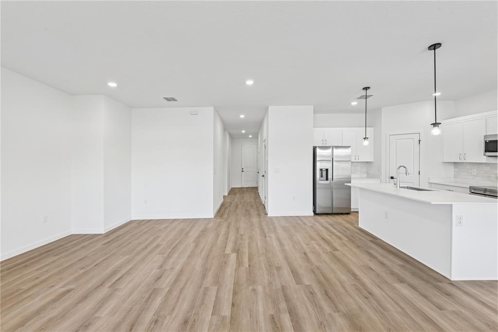 17875 Southwest 68th Place Dunnellon, FL 34432 - Photo 4 of 14 a view of a kitchen with wooden floor