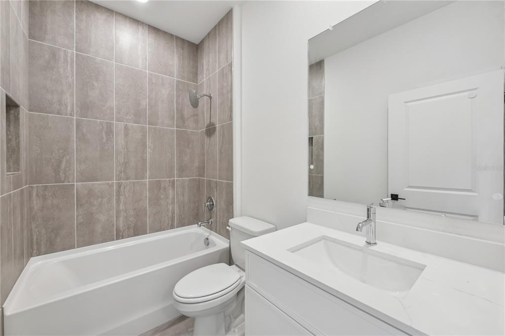 17875 Southwest 68th Place Dunnellon, FL 34432 - Photo 10 of 14 a bathroom with a sink toilet and shower