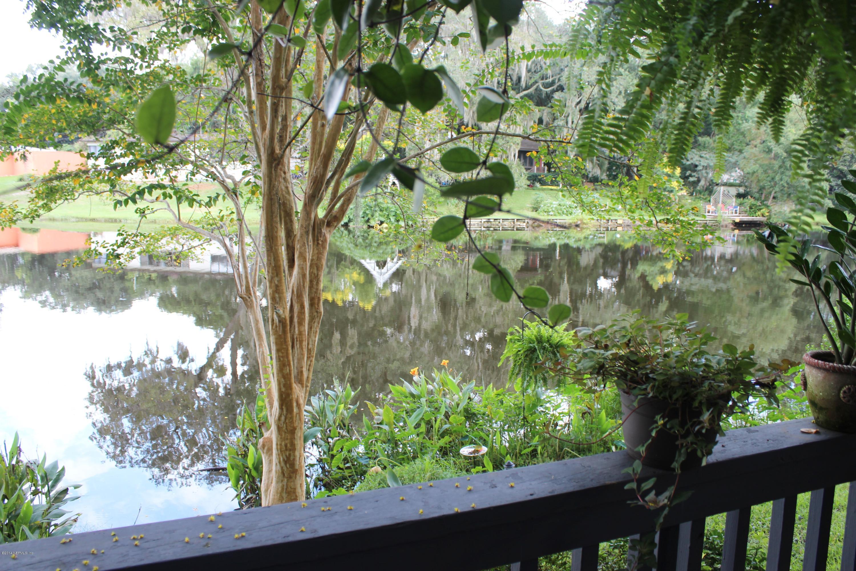 5512 Stanford Road Jacksonville, FL 32207 - Photo 18 of 22 a view of a garden from a balcony