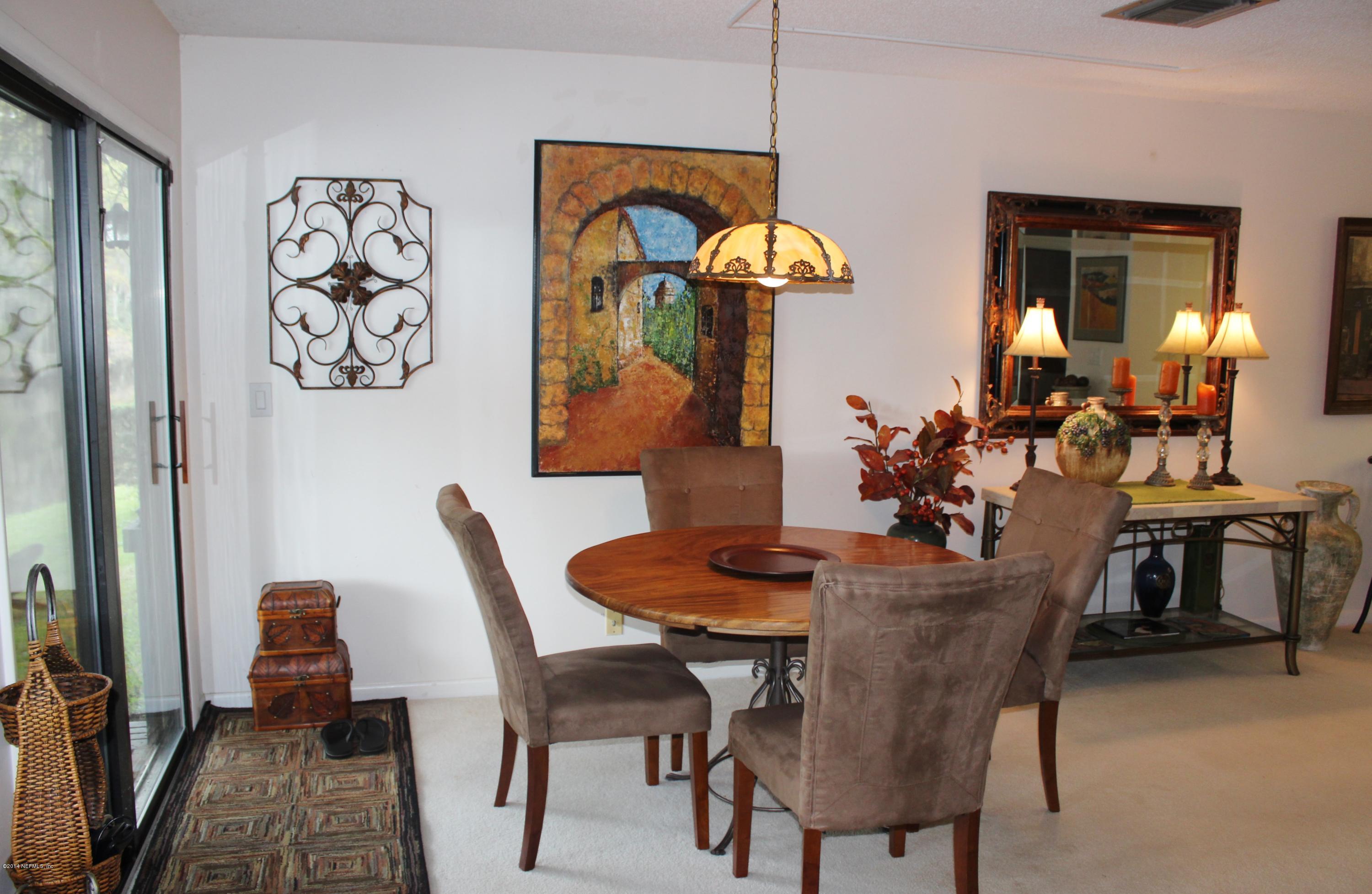 5512 Stanford Road Jacksonville, FL 32207 - Photo 8 of 22 a dining room with furniture and window