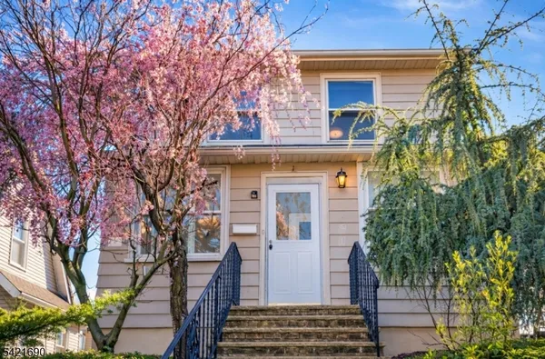 a kitchen with a sink cabinets and window