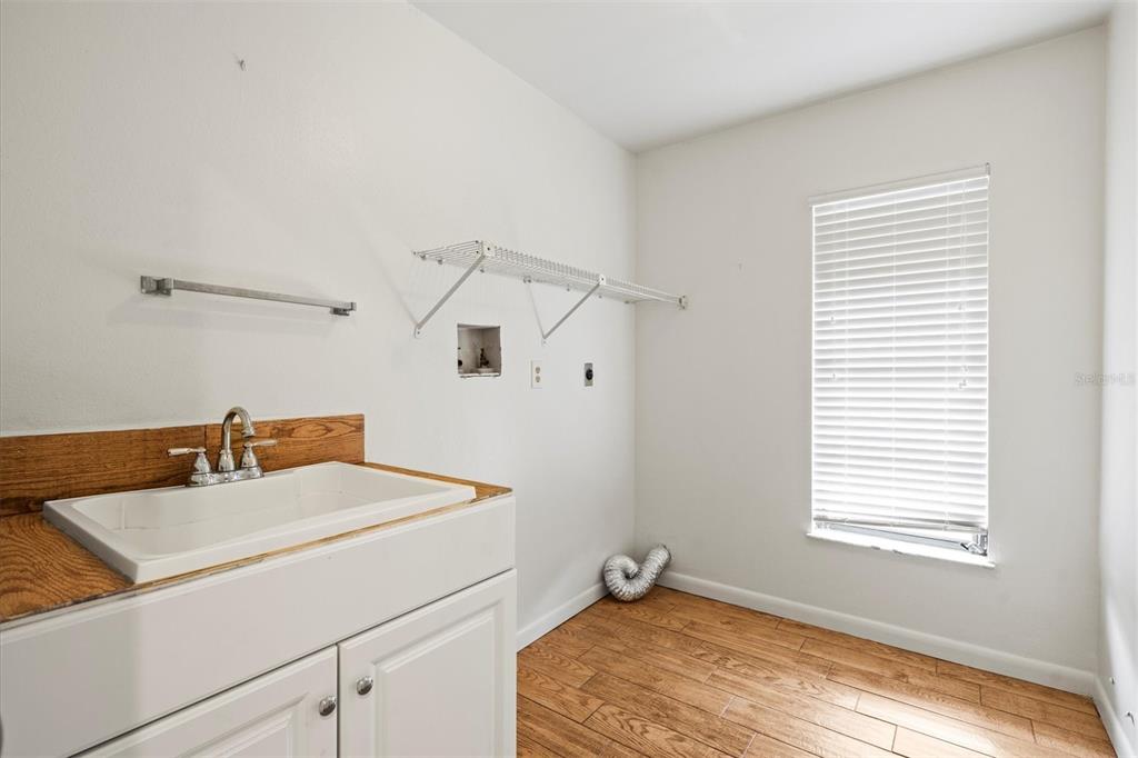 2027 Beckwith Avenue Spring Hill, FL 34608 - Photo 31 of 35 Laundry Room