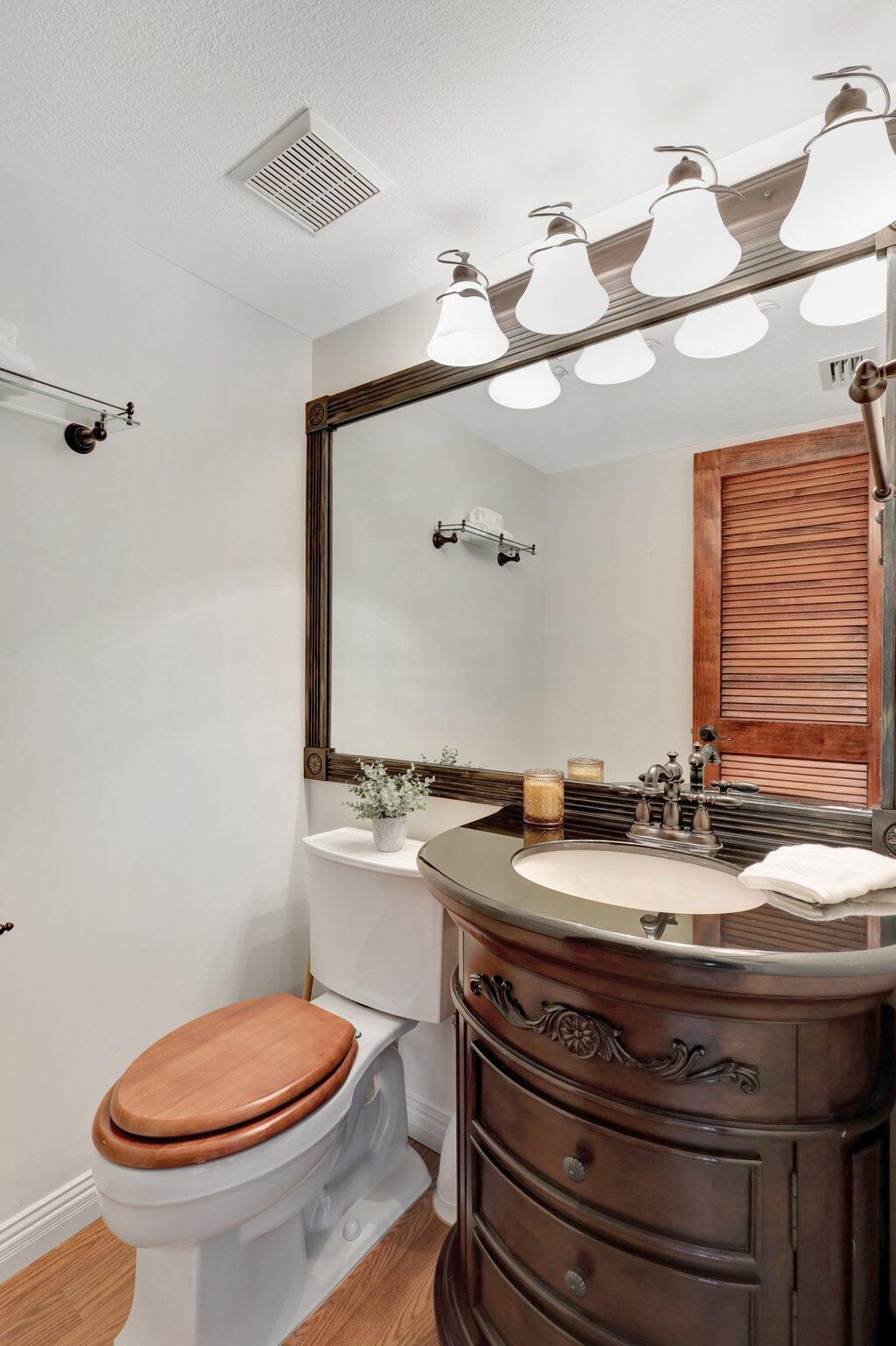 81 Southeast Beech Tree Lane Stuart, FL 34994 - Photo 8 of 35 Main Floor Bathroom