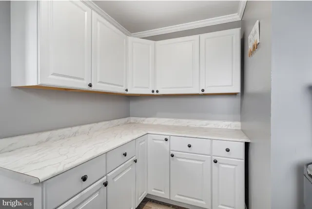 a view of cabinets with cabinets