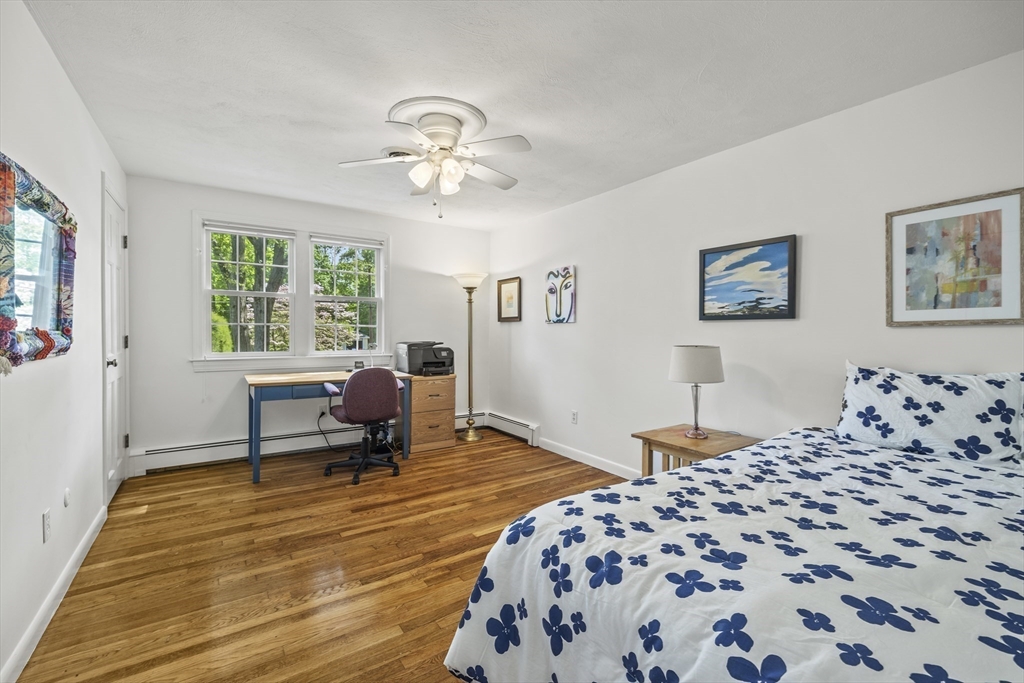 74 Brook Road Sharon, MA 02067 - Photo 17 of 32 a bedroom with furniture and a window