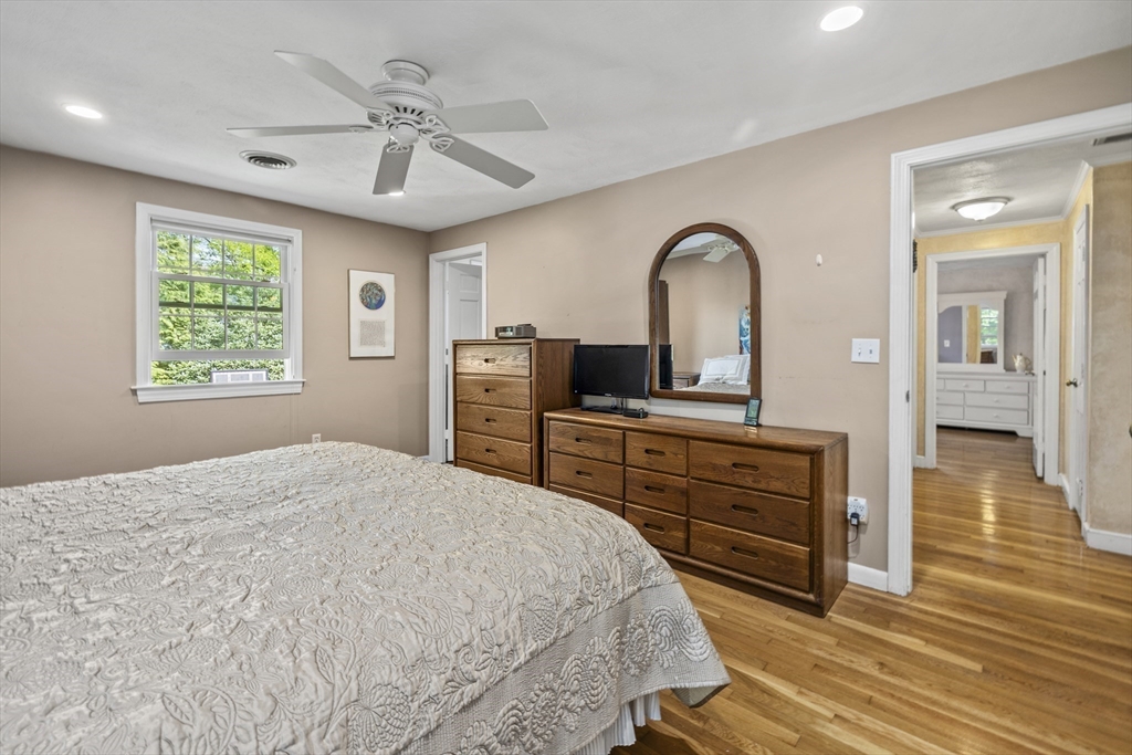74 Brook Road Sharon, MA 02067 - Photo 23 of 32 a bedroom with a bed and a dresser