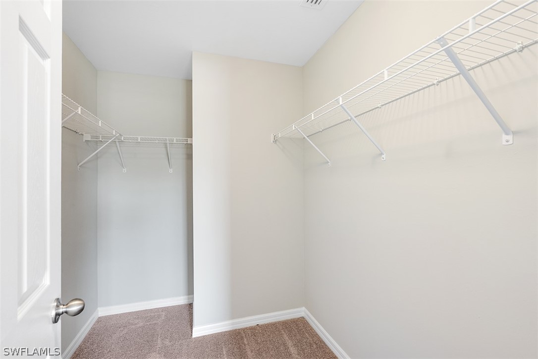 2819 37th Street Southwest Lehigh Acres, FL 33976 - Photo 11 of 14 a view of closet