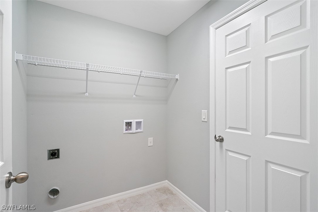 2819 37th Street Southwest Lehigh Acres, FL 33976 - Photo 13 of 14 a bathroom with a shower