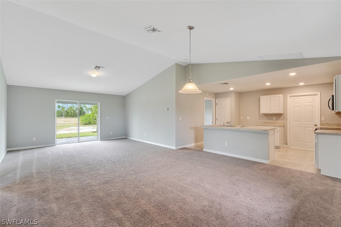 2819 37th Street Southwest Lehigh Acres, FL 33976 - Photo 2 of 14 a view of large kitchen with a sink and a window