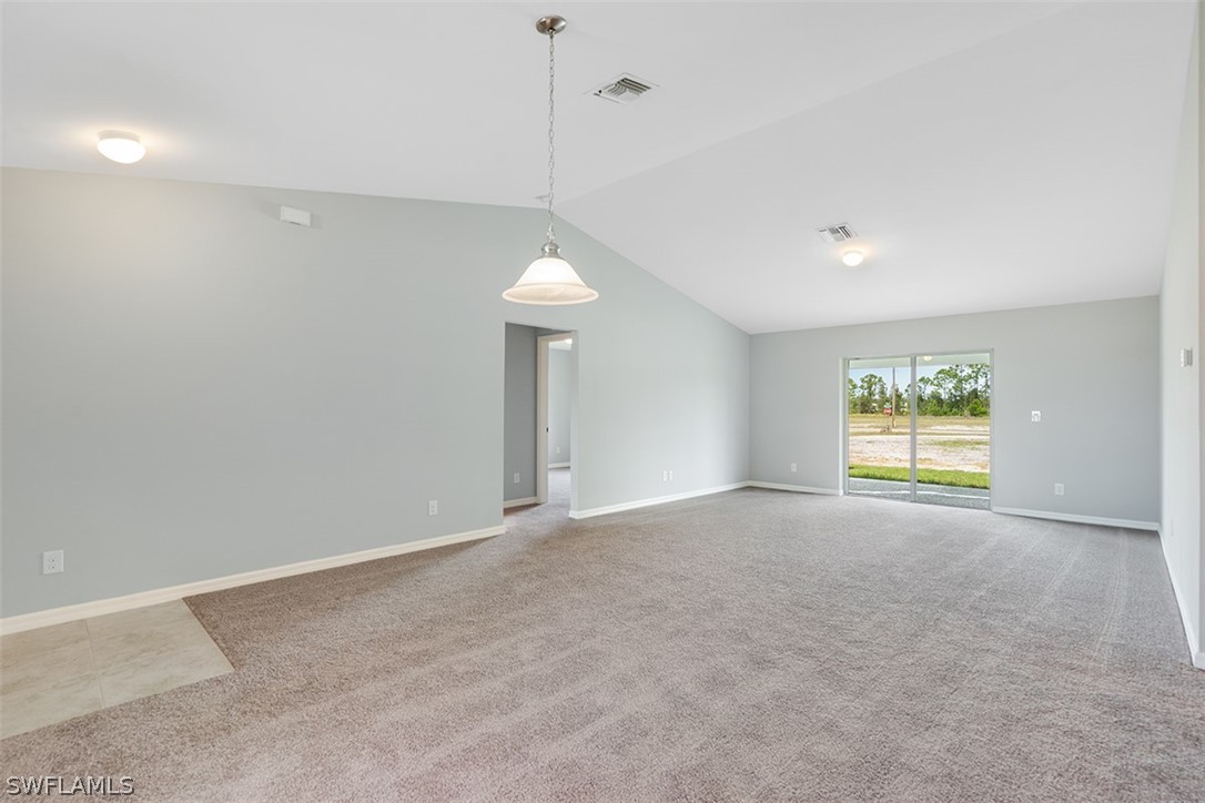 2819 37th Street Southwest Lehigh Acres, FL 33976 - Photo 7 of 14 a view of an empty room with a window