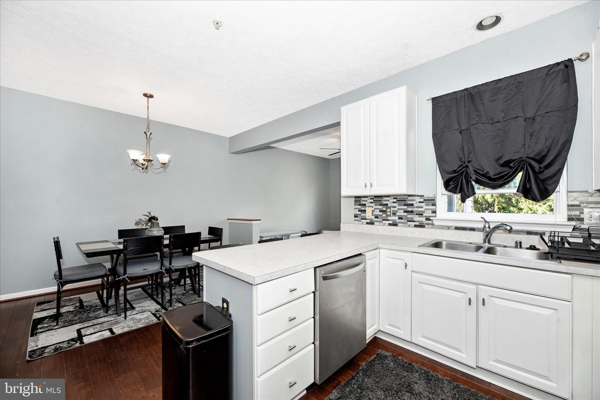 1422 Roman Ridge Way Bel Air, MD 21014 - Photo 16 of 57 a kitchen with a sink appliances and cabinets