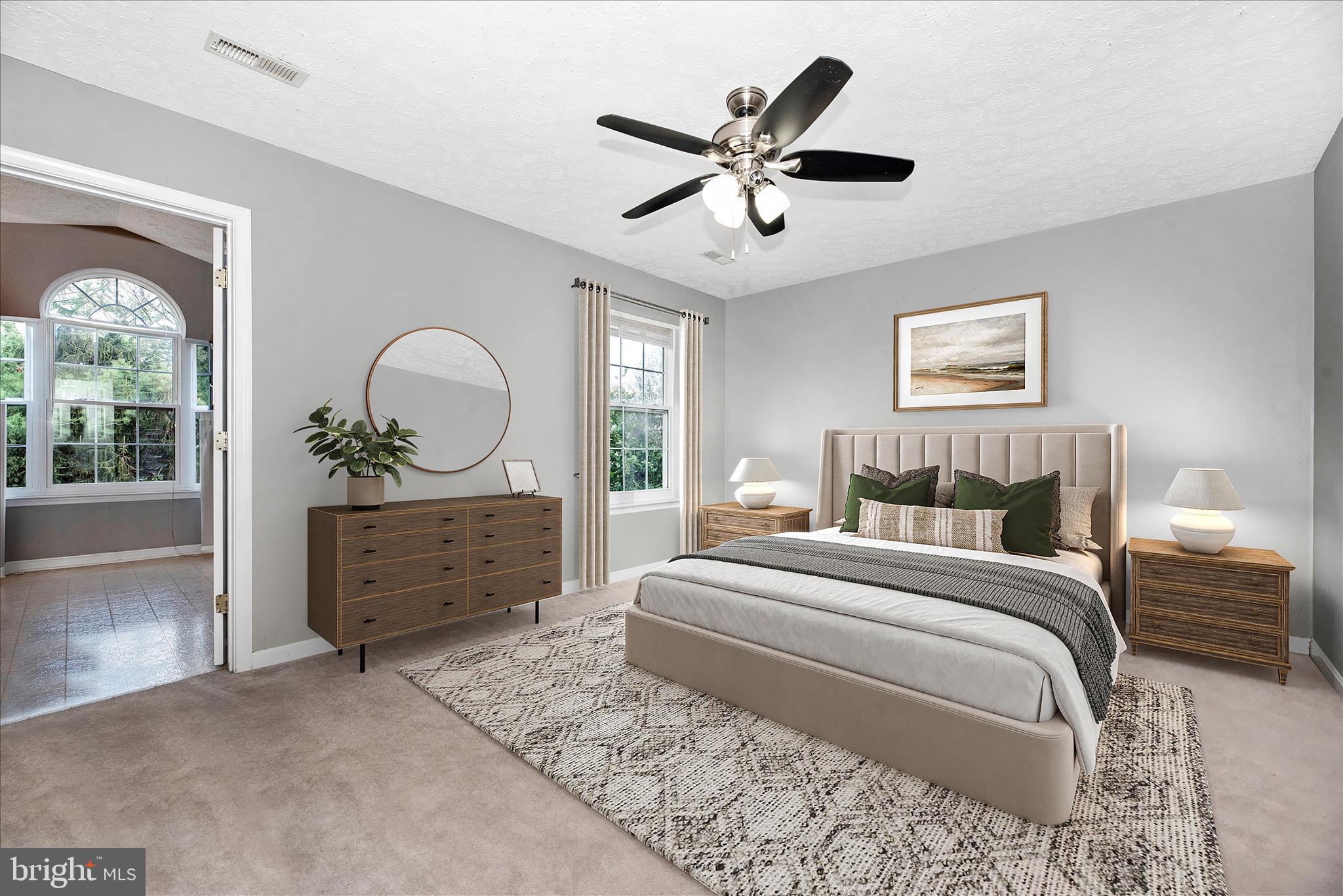 1422 Roman Ridge Way Bel Air, MD 21014 - Photo 24 of 57 a bed room with a bed and a mirror