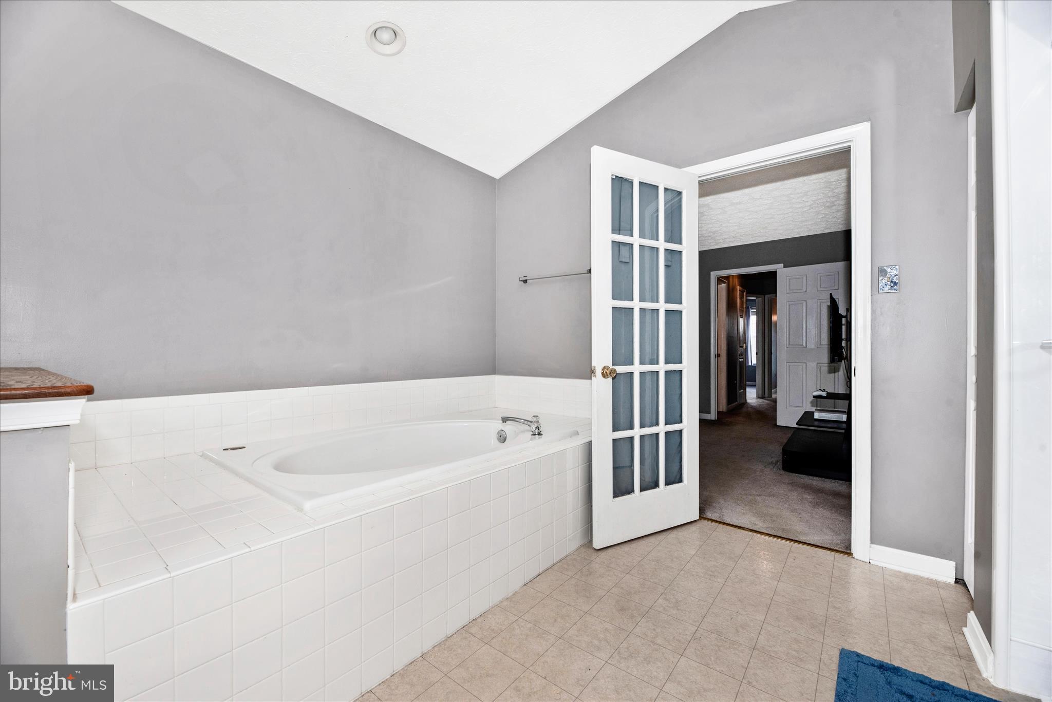 1422 Roman Ridge Way Bel Air, MD 21014 - Photo 31 of 57 a bathroom with a bathtub and a sink