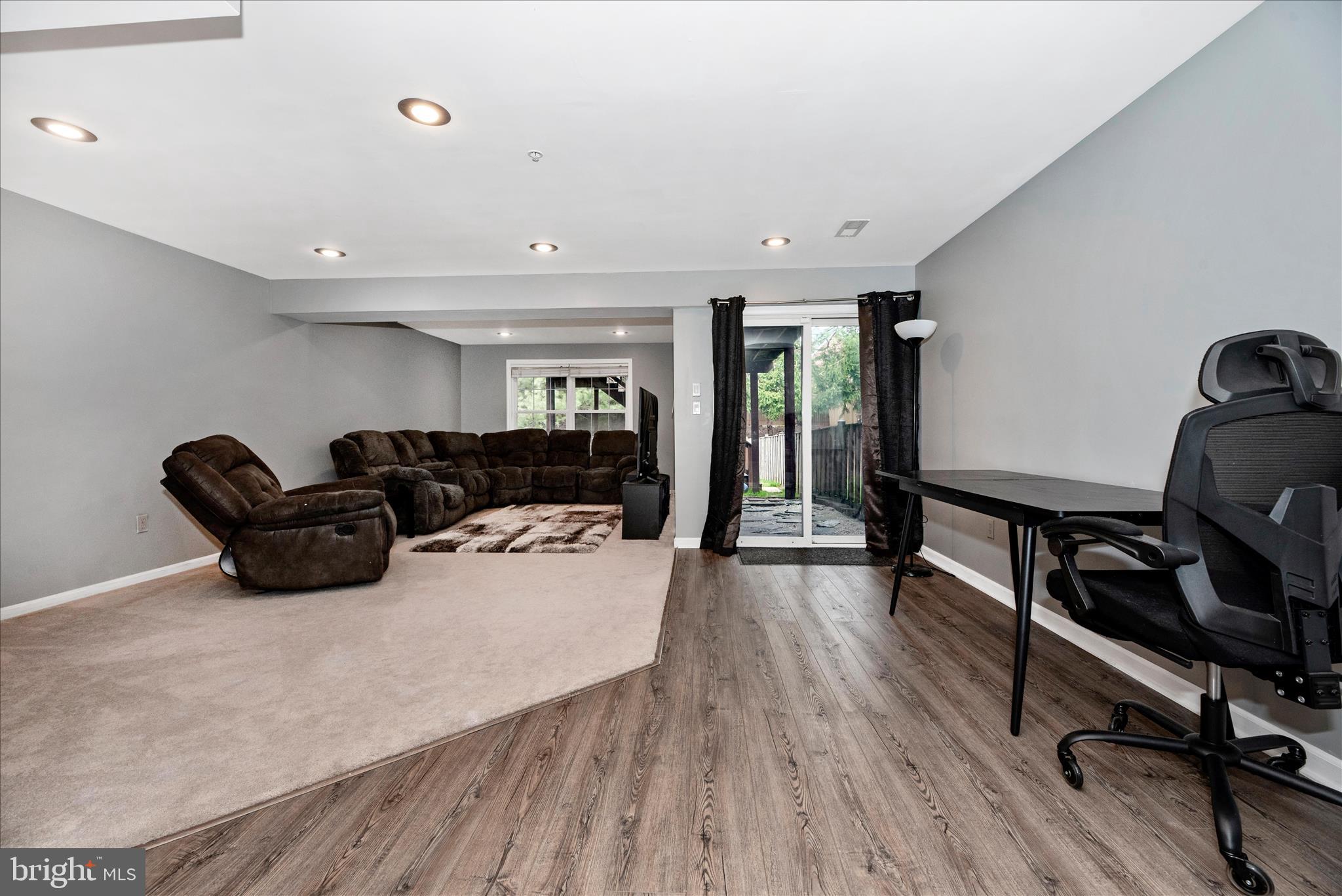 1422 Roman Ridge Way Bel Air, MD 21014 - Photo 39 of 57 a living room with furniture and a wooden floor