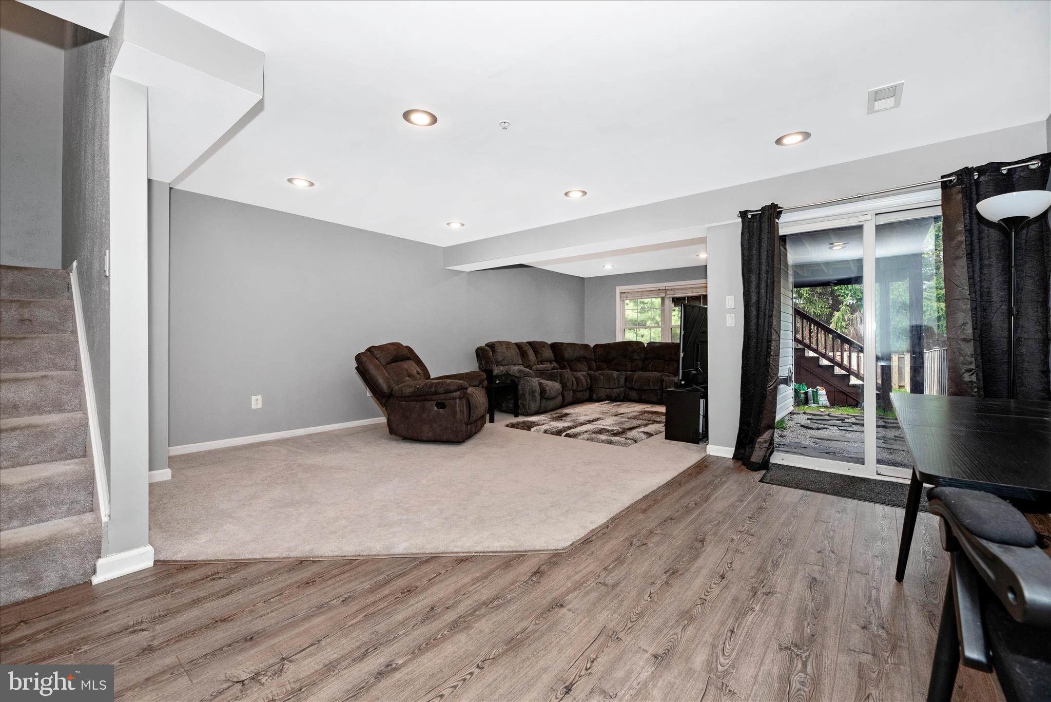 1422 Roman Ridge Way Bel Air, MD 21014 - Photo 40 of 57 a living room with furniture and a wooden floor