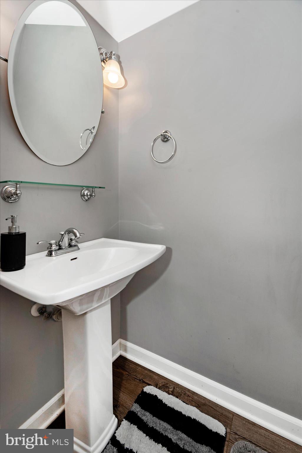 1422 Roman Ridge Way Bel Air, MD 21014 - Photo 42 of 57 a bathroom with a sink and mirror