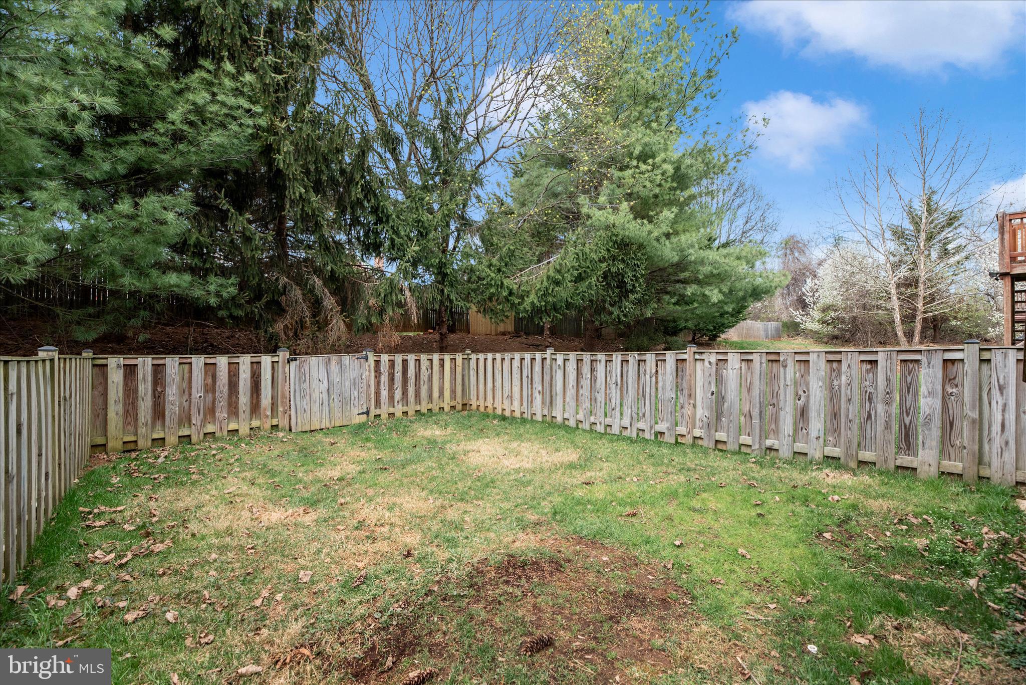 1422 Roman Ridge Way Bel Air, MD 21014 - Photo 52 of 57 a view of a yard with wooden fence