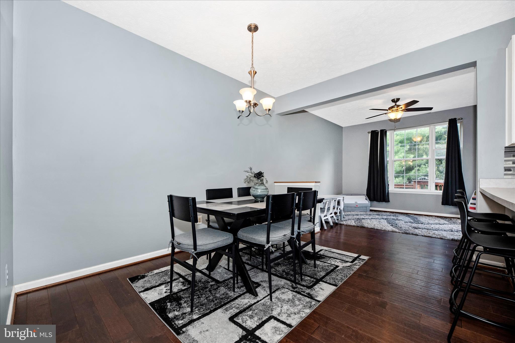 1422 Roman Ridge Way Bel Air, MD 21014 - Photo 10 of 57 a view of a dining room with furniture window and wooden floor