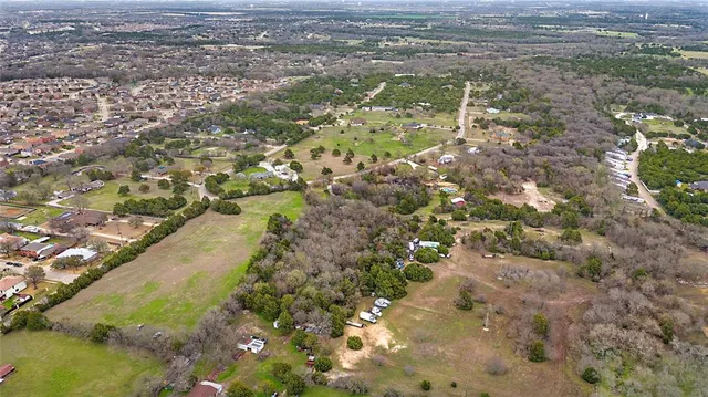 a view of a yard with a lake view