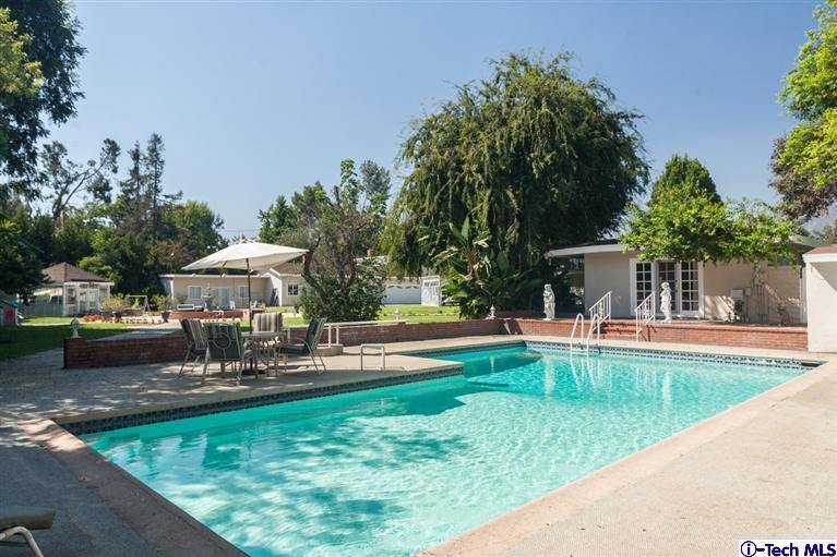 Undisclosed Address Pasadena, CA 91107 - Photo 13 of 16 swimming pool view with a seating space and a garden